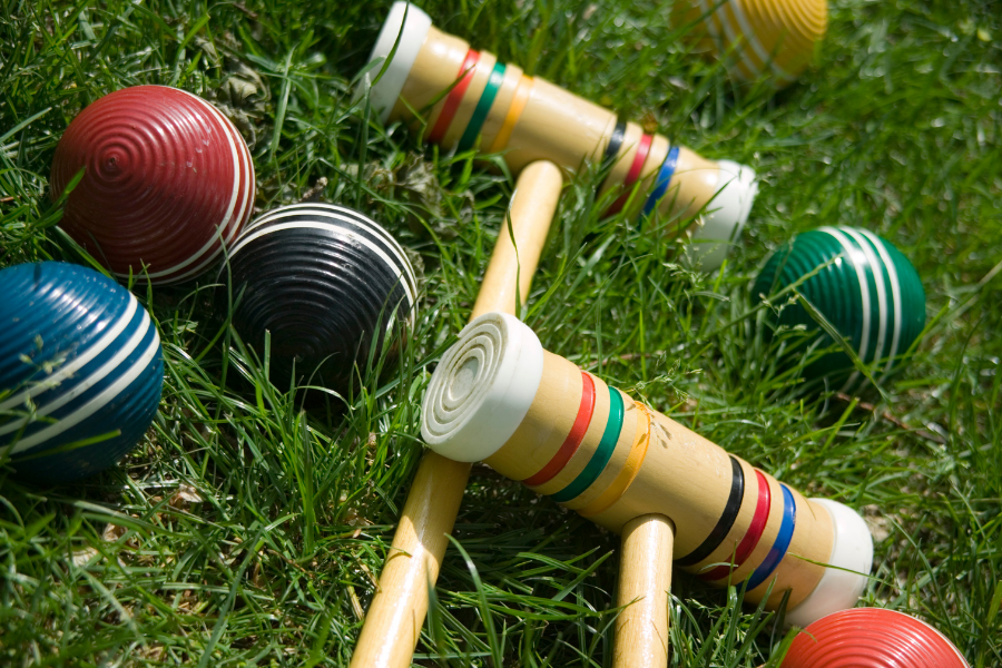 A croquet set, points to place a hold on outdoor games at the Main Library.
