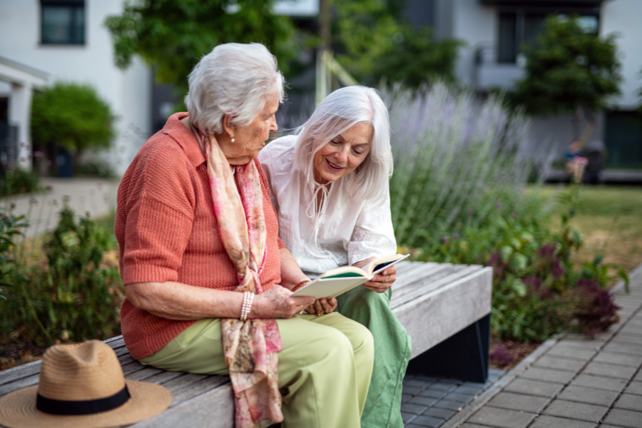 Two woman talk about a book, leads to recommendations for adults page.