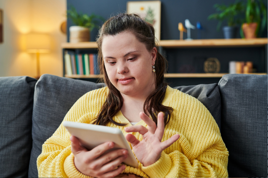Teen on tablet.